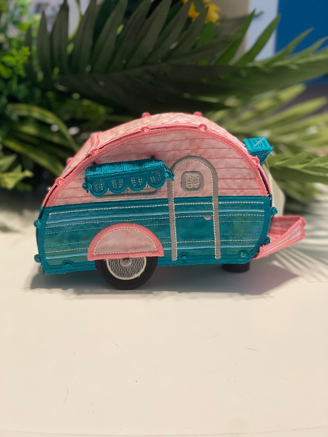 Pink and teal camper