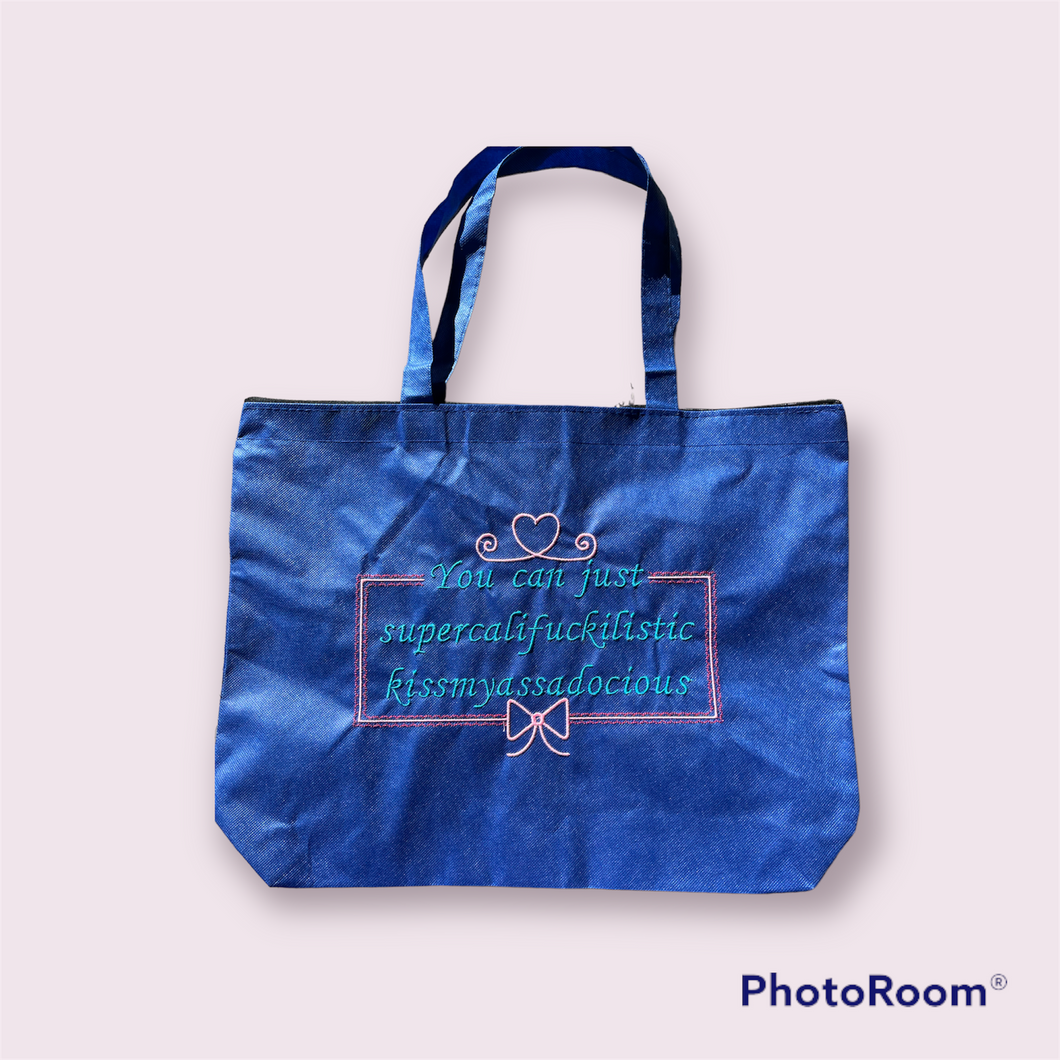 Supercali on blue tote bag